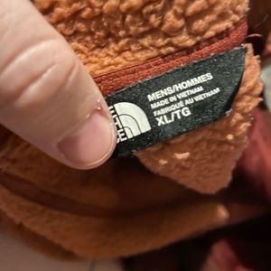 The north face orange fleece jacket
